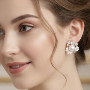 Flower and pearl earrings with a bow. Elegant stud earrings. 3 Cm